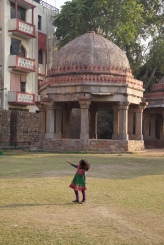 Twirling in front of an ancient madrasa